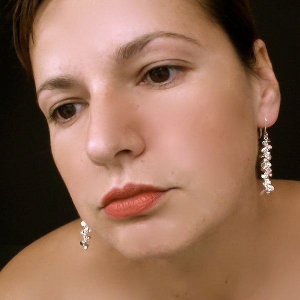 Harmony dangling Earrings, polished silver by Fiona DeMarco