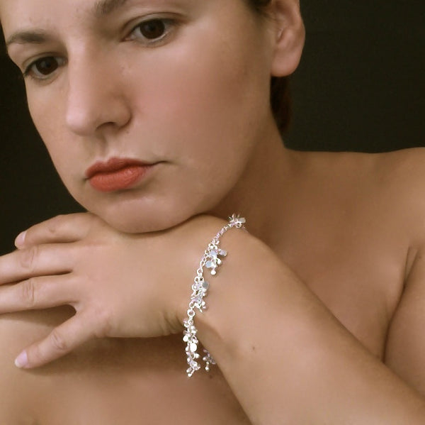 Harmony charm Bracelet, polished silver by Fiona DeMarco