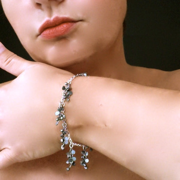 Harmony charm Bracelet, oxidised silver by Fiona DeMarco