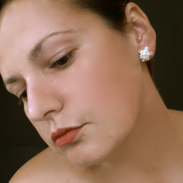 Symphony reverse stud Earrings, polished silver by Fiona DeMarco
