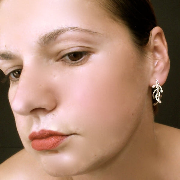 Contour stud Earrings, polished silver by Fiona DeMarco