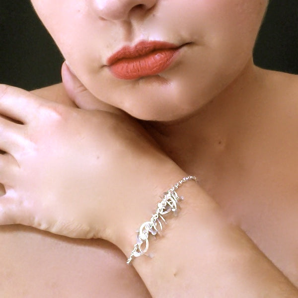 Contour semi Bracelet, polished silver by Fiona DeMarco