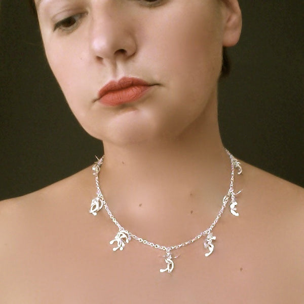 Contour charm Necklace, polished silver by Fiona DeMarco