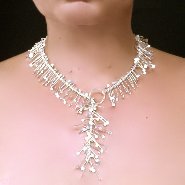 Signature lariat Necklace, polished silver by Fiona DeMarco