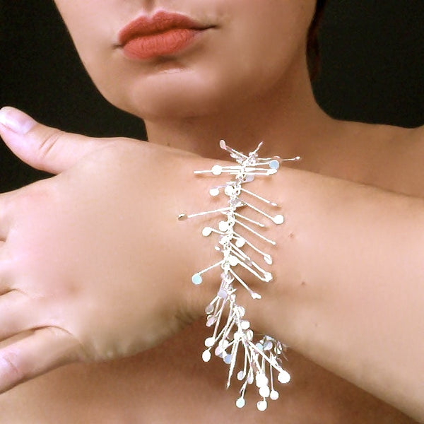 Signature Bracelet, polished silver by Fiona DeMarco