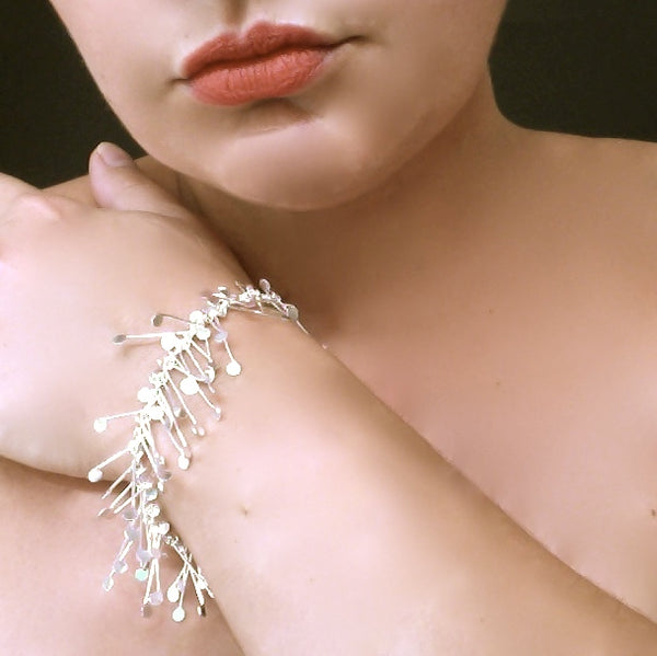 Signature Bracelet, polished silver by Fiona DeMarco