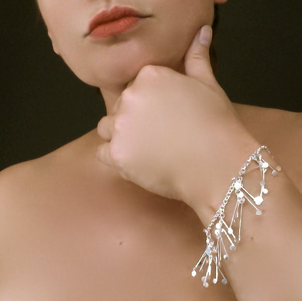 Signature charm Bracelet, polished silver by Fiona DeMarco