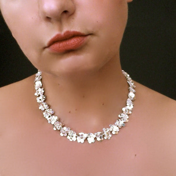 Symphony Necklace, polished silver by Fiona DeMarco