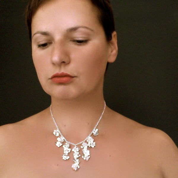 Symphony semi graduated Necklace, polished silver by Fiona DeMarco