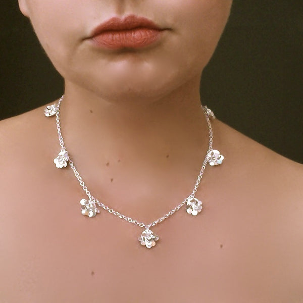Symphony charm Necklace, polished silver by Fiona DeMarco
