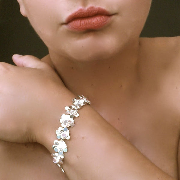 Symphony Bracelet, polished silver by Fiona DeMarco 