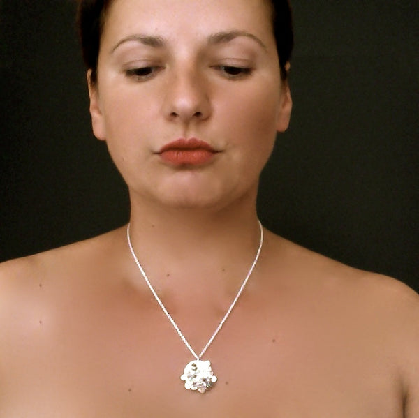 Symphony Pendant, polished silver by Fiona DeMarco