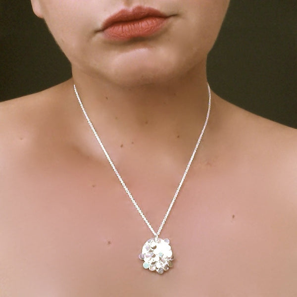 Symphony Pendant, polished silver by Fiona DeMarco