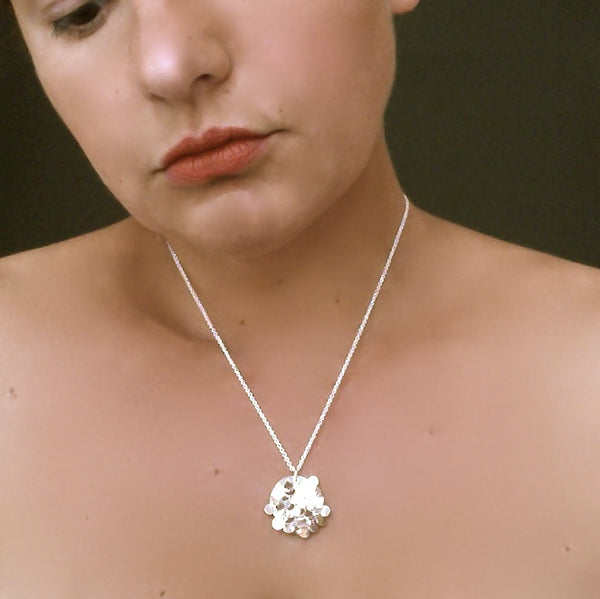 Symphony Pendant, polished silver by Fiona DeMarco