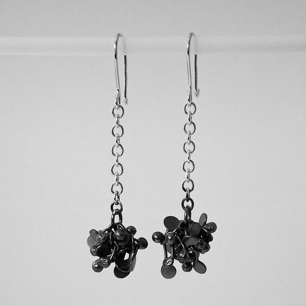 Radiance dangling Earrings, oxidised silver by Fiona DeMarco