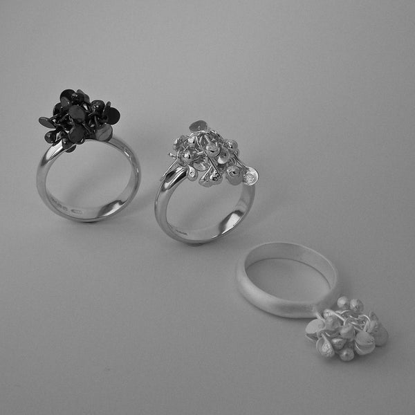 Radiance Rings, oxidised, polished and satin silver by Fiona DeMarco