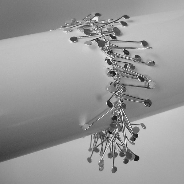 Signature Bracelet, polished silver by Fiona DeMarco