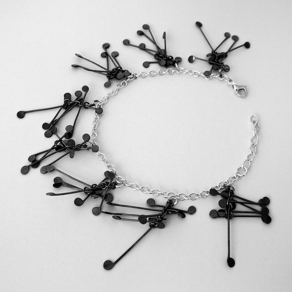 Signature charm Bracelet, oxidised silver by Fiona DeMarco