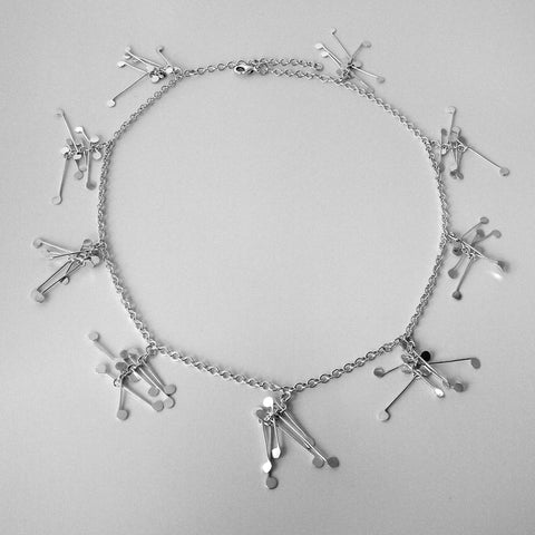 Signature charm Necklace, polished silver by Fiona DeMarco