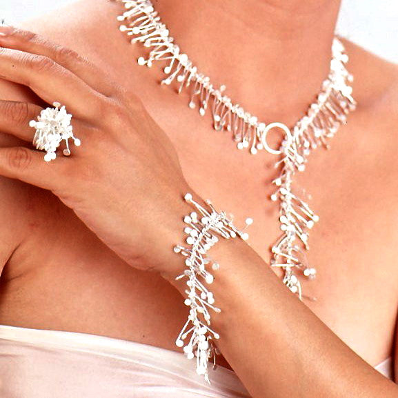Signature lariat necklace, bracelet and wide cluster ring, satin silver by Fiona DeMarco