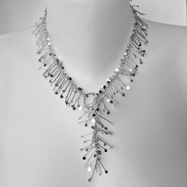 Signature lariat Necklace, polished silver by Fiona DeMarco