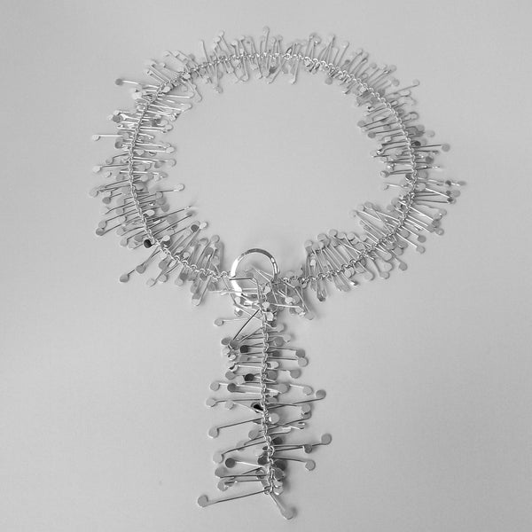 Signature lariat Necklace, polished silver by Fiona DeMarco