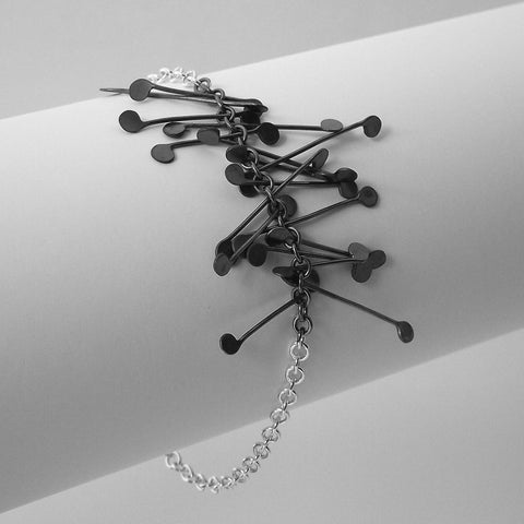 Signature semi Bracelet, oxidised silver by Fiona DeMarco