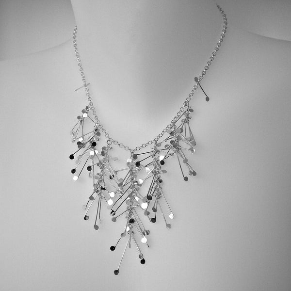 Signature semi graduated Necklace, polished silver by Fiona DeMarco