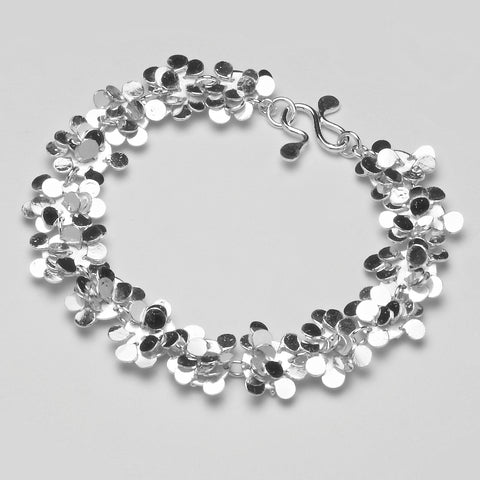 Symphony Bracelet, polished silver by Fiona DeMarco 