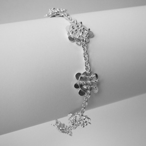 Symphony charm Bracelet reverse side, polished silver by Fiona DeMarco