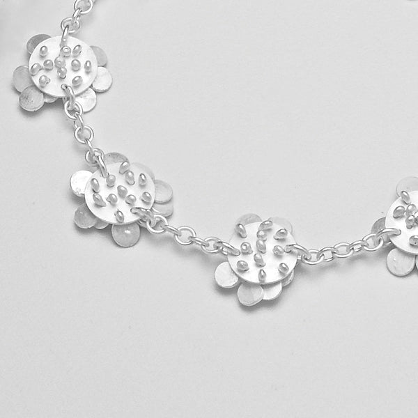 Symphony charm Bracelet reverse side, satin silver by Fiona DeMarco