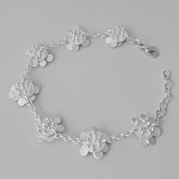 Symphony charm Bracelet reverse side, satin silver by Fiona DeMarco