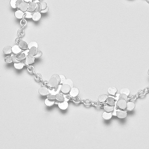 Symphony charm Bracelet, satin silver by Fiona DeMarco