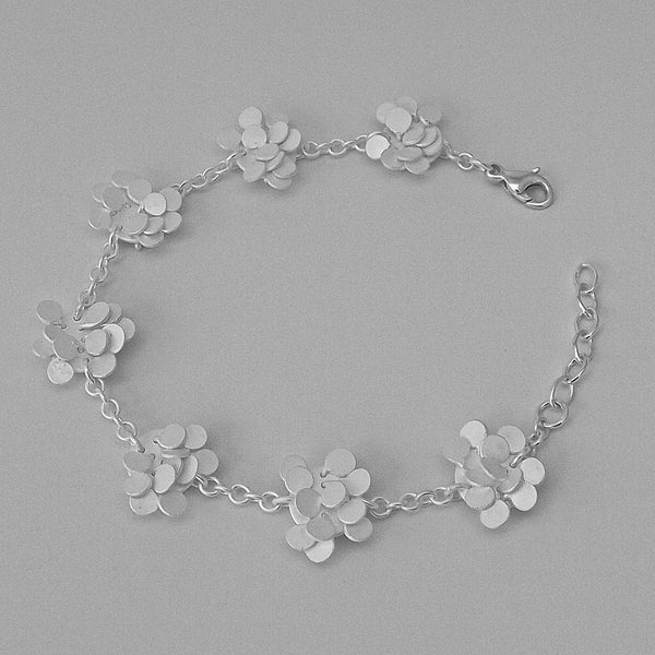 Symphony charm Bracelet, satin silver by Fiona DeMarco