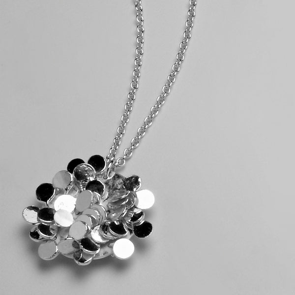 Symphony Pendant, polished silver by Fiona DeMarco