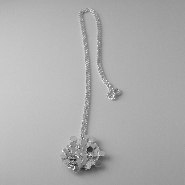 Symphony Pendant, polished silver by Fiona DeMarco