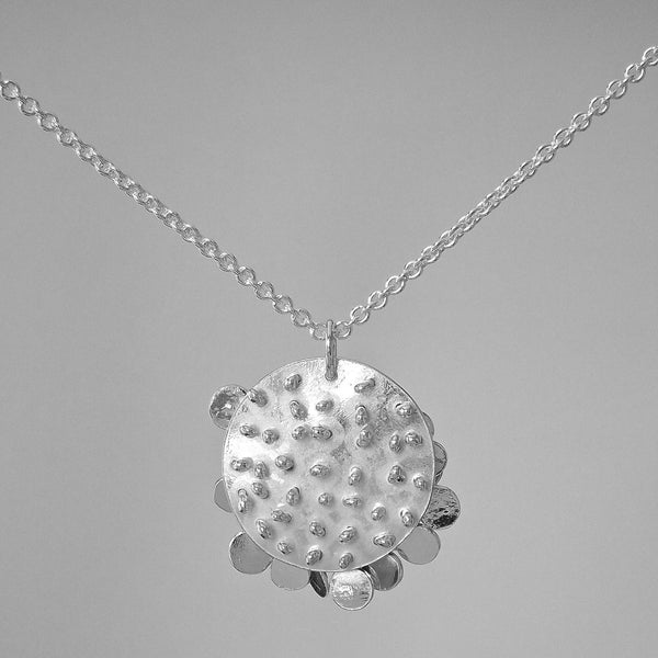 Symphony Pendant reverse side, polished silver by Fiona DeMarco