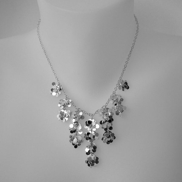Symphony semi graduated Necklace, polished silver by Fiona DeMarco
