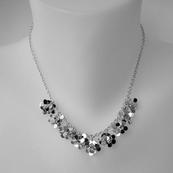 Symphony semi Necklace, polished silver by Fiona DeMarco