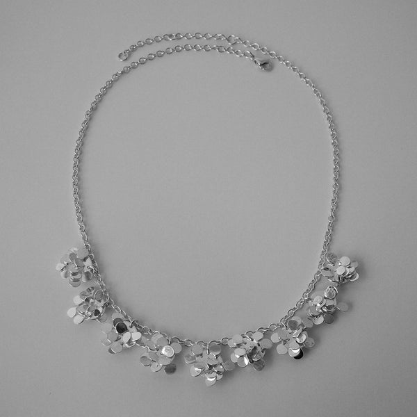 Symphony semi Necklace, polished silver by Fiona DeMarco