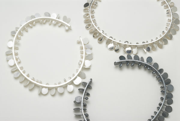 Icon Bangles, polished, oxidised and satin silver by Fiona DeMarco