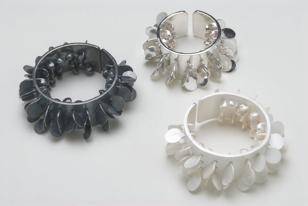 Icon wide Rings, satin, polished and oxidised silver by Fiona DeMarco