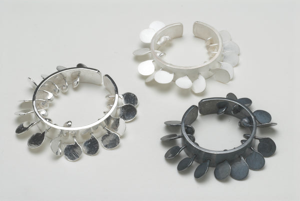 Icon Rings, satin, oxidised and polished silver by Fiona DeMarco