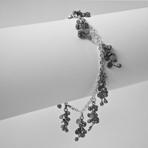 Harmony charm Bracelet, oxidised silver by Fiona DeMarco
