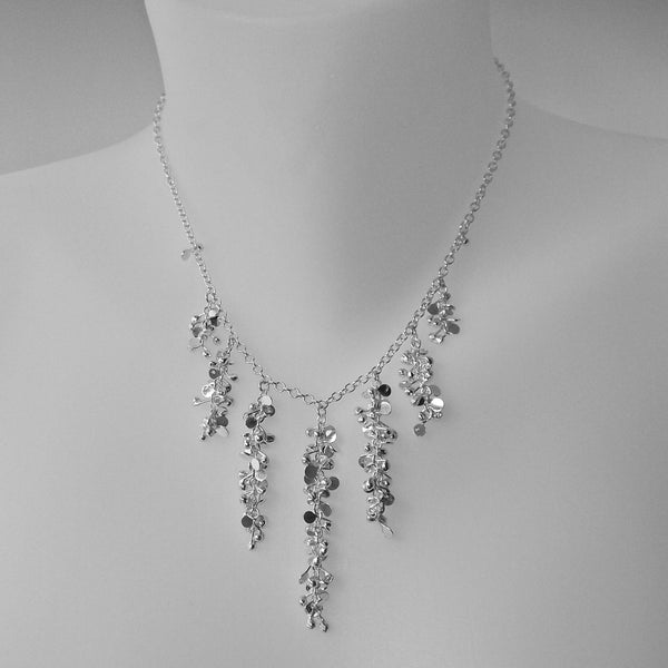 Harmony semi graduated Necklace, polished silver by Fiona DeMarco